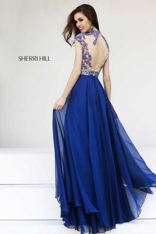 Взять в прокат Женская одежда Платья SHERRI HILL SH037 Москва Взять в прокат Женская одежда Платья SHERRI HILL SH037; Москва , г.Москва, Малый Конюшковский переулок, дом 2 (Галерея MOD DESIGN) ул.; Описание: Назначение: выпускной бал, венский бал, последний звонок, романтический вечер, студийная или выездная фотосессия, новогоднее торжество, корпоративная вечеринка, празднование дня рождения.
Описание модели: вечернее платье в пол, с многослойной юбкой из шифона и небольшим шлейфом. Верх платья изящно расшит стеклярусом, бисером, пайетками и стразами на тонкой сетчатой ткани. Внутренняя подкладка выполнена из атласа телесного цвета. Лиф с чашечками. Фасон данной модели выполнен "под горло" и прикрывает плечи. Спина открыта.