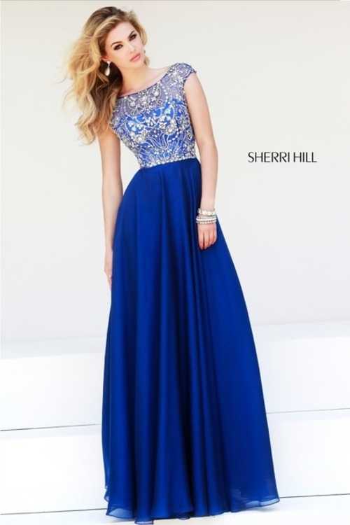 Взять в прокат Женская одежда Платья SHERRI HILL SH006 Москва Взять в прокат Женская одежда Платья SHERRI HILL SH006; Москва , г.Москва, Малый Конюшковский переулок, дом 2 (Галерея MOD DESIGN) ул.; Описание: Назначение: выпускной бал, венский бал, романтический вечер, студийная или выездная фотосессия, новогоднее торжество, корпоративная вечеринка
Описание модели: Вечернее платье в пол классического силуэта. Верх платья закрытый, декорирован стеклярусом, бисером, пайетками и стразами, создающие красивый узор. Лиф с чашечками. На спине "V"образный вырез. Юбка многослойная со шлейфом. Это платье - легенда!