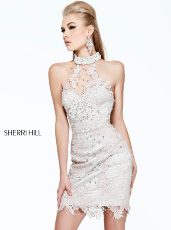 Взять в прокат Женская одежда Платья SHERRI HILL SH010 Москва Взять в прокат Женская одежда Платья SHERRI HILL SH010; Москва , г.Москва, Малый Конюшковский переулок, дом 2 (Галерея MOD DESIGN) ул.; Описание: Назначение: последний звонок, романтический вечер, студийная или выездная фотосессия, новогоднее торжество, корпоративная вечеринка.
Описание модели: нежное, коктейльное платье из ажурного кружева с россыпью жемчужных бусин и страз. Ворот "американка". Лиф с чашечками. Ажурная закрытая спина.