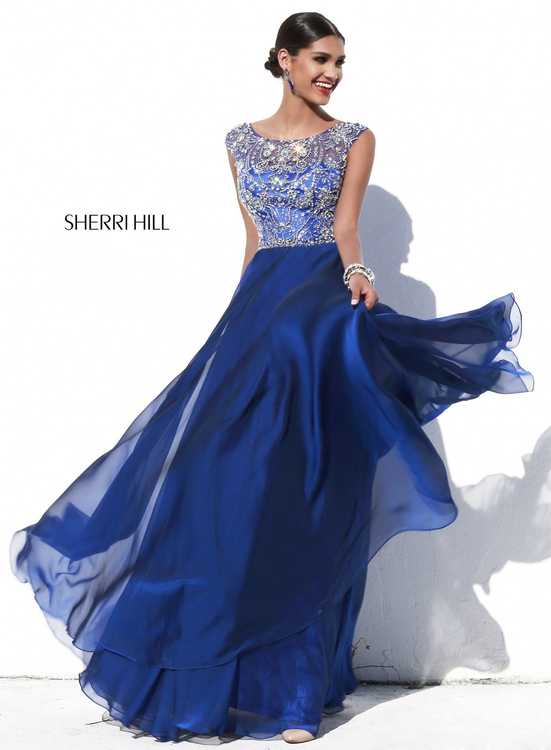 Взять в прокат Женская одежда Платья SHERRI HILL SH006 Москва Взять в прокат Женская одежда Платья SHERRI HILL SH006; Москва , г.Москва, Малый Конюшковский переулок, дом 2 (Галерея MOD DESIGN) ул.; Описание: Назначение: выпускной бал, венский бал, романтический вечер, студийная или выездная фотосессия, новогоднее торжество, корпоративная вечеринка
Описание модели: Вечернее платье в пол классического силуэта. Верх платья закрытый, декорирован стеклярусом, бисером, пайетками и стразами, создающие красивый узор. Лиф с чашечками. На спине "V"образный вырез. Юбка многослойная со шлейфом. Это платье - легенда!